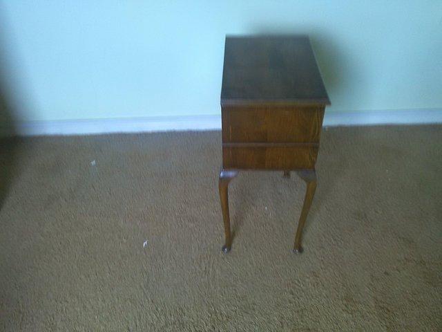 Preview of the first image of Antique Wooden table/sewing box.