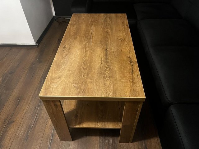 Preview of the first image of Solid wood coffee table - like new 120Lx80Wx60H.