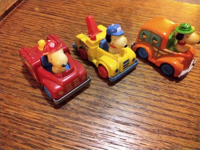 Preview of the first image of PEANUTS CHARACTERS  IN CARS THREE IN ALL.