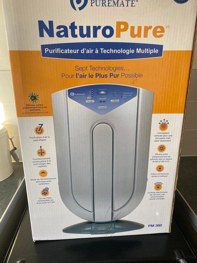 Preview of the first image of Air Purifier cleans the air cuts down on dust.