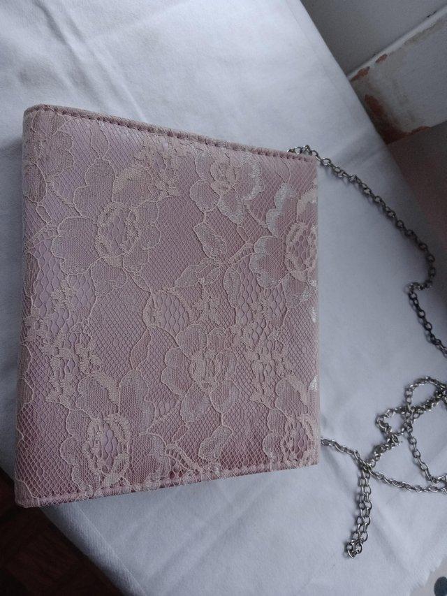 Preview of the first image of Small rose pink coloured evening bag.