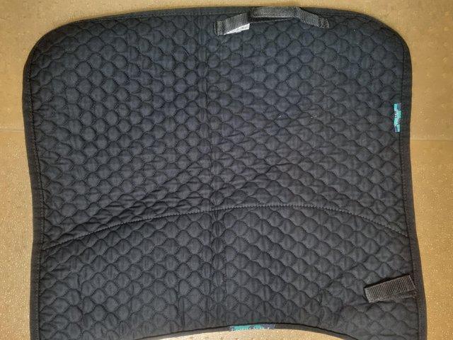 Preview of the first image of Nuumed Hi-wither half wool dressage saddle pad.
