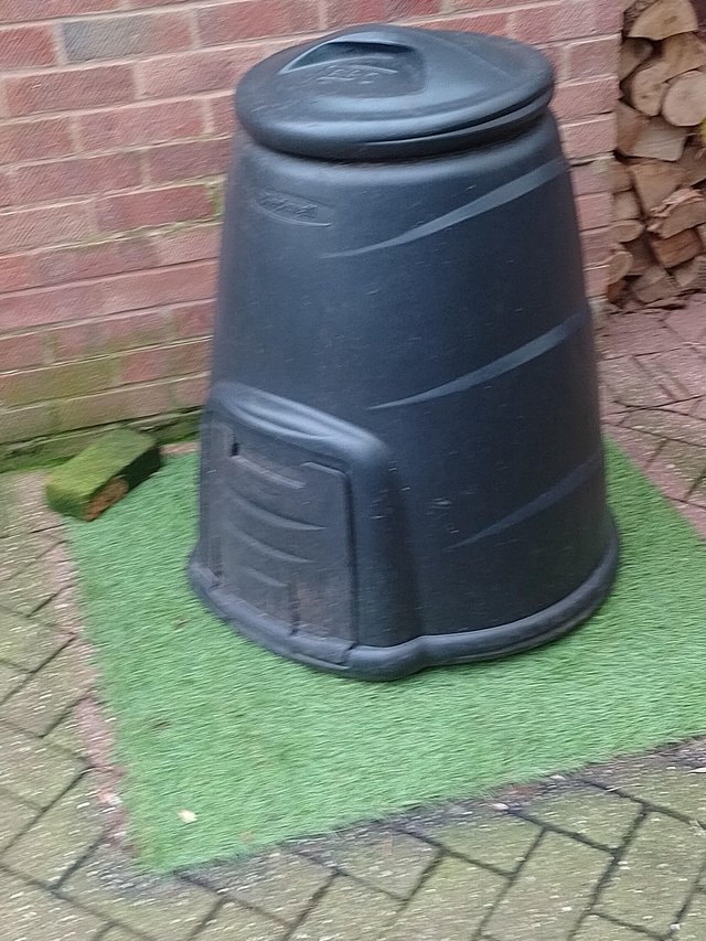 Preview of the first image of Plastic garden compost bin with hatch and windproof lid.
