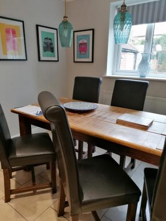 Image 2 of Solid Wooden table with 6 leather chairs