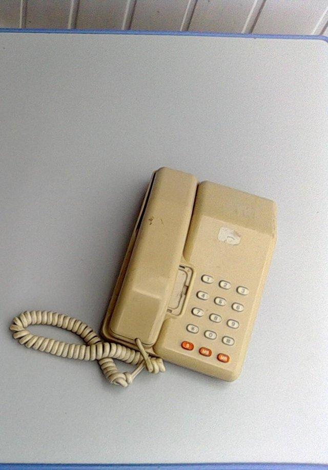 Preview of the first image of For sale one old slimline style telephone.