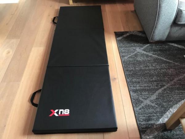 Image 1 of Xn8 Tri-Fold Gymnastics Mat with Carrying Handles.
