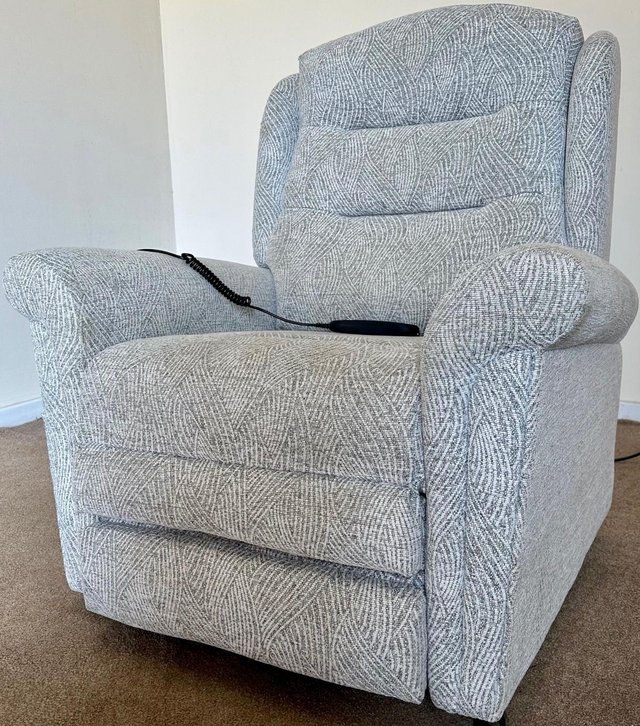 Preview of the first image of PRIDE ELECTRIC RISER RECLINER DUAL MOTOR GREY CHAIR DELIVERY.
