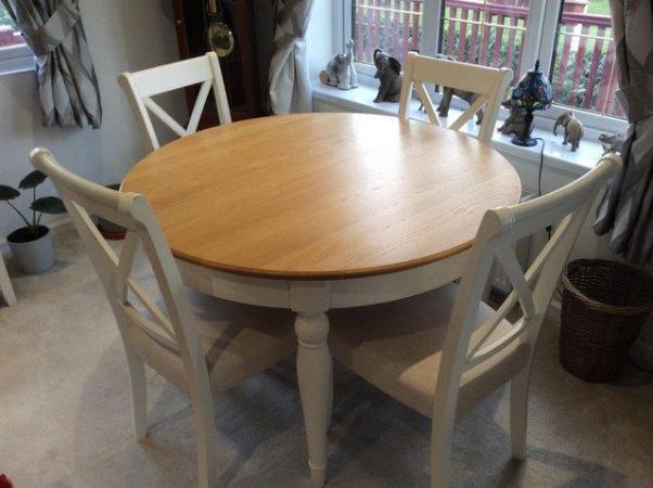 Image 2 of Extending dining table and four chairs