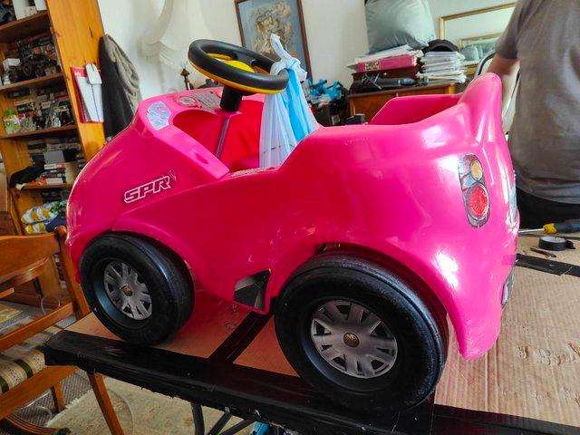 Preview of the first image of Small 6 volt electric ride on car in pink.