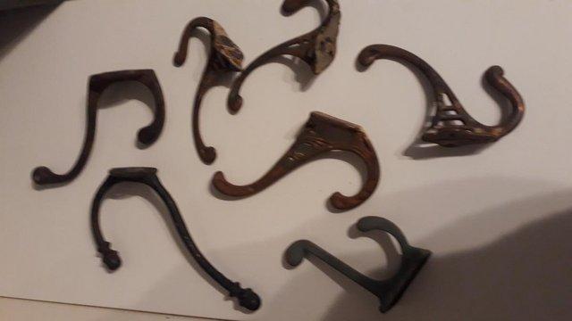 Image 2 of Collection of pretty brass Vintage door hooks
