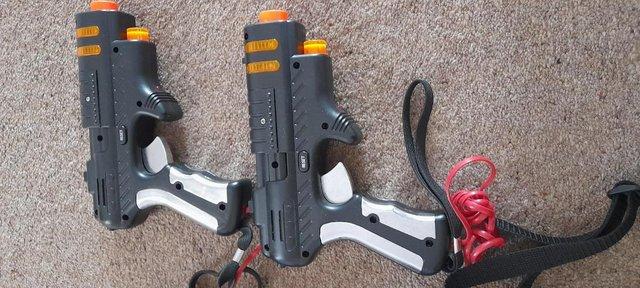 Preview of the first image of 2 x Toy laser guns battery operated.