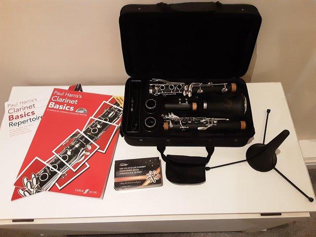 Preview of the first image of B FLAT LADE CLARINET WITH CASE, STAND AND MANUALS.