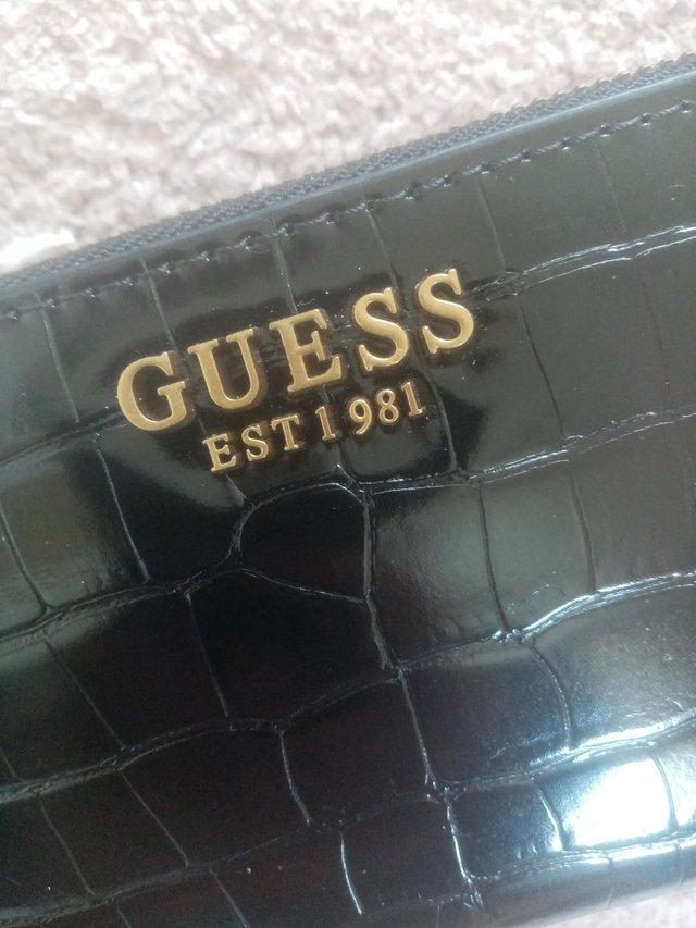 Preview of the first image of Croc guess purse genuine large.
