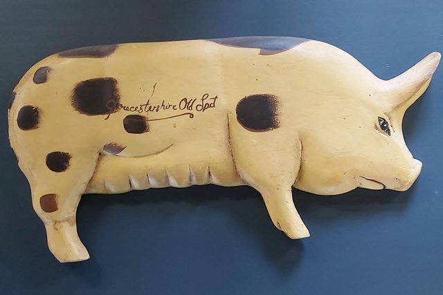 Preview of the first image of £35 old painted carved pig wooden plaque.