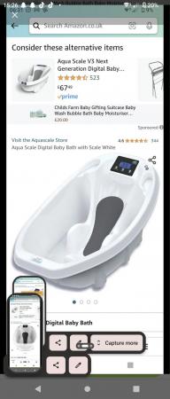 Image 1 of Digital baby bath shows there weight