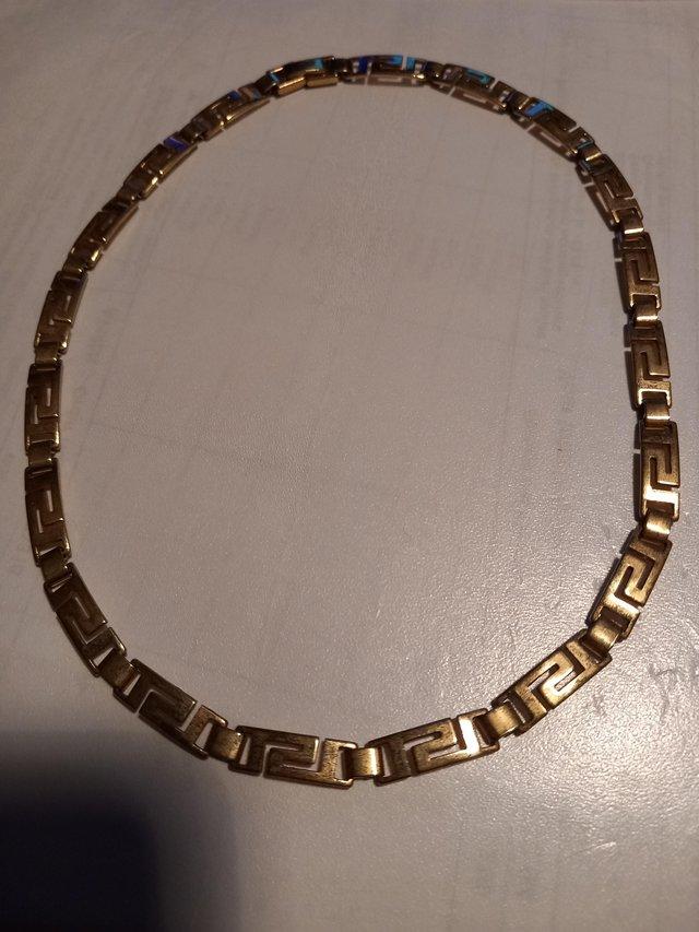 Preview of the first image of 9 carat gold overlay Greek keys necklace.