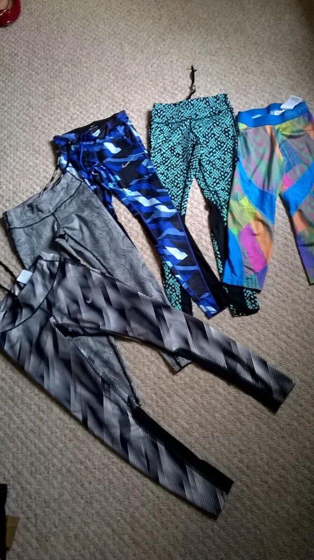 Preview of the first image of NIKE LEGGINGS 5 PAIRS BUNDLE FREE POST.