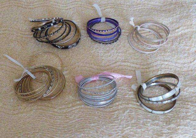 Preview of the first image of BAG JOB LOT OF BANGLES 49 IN TOTAL.