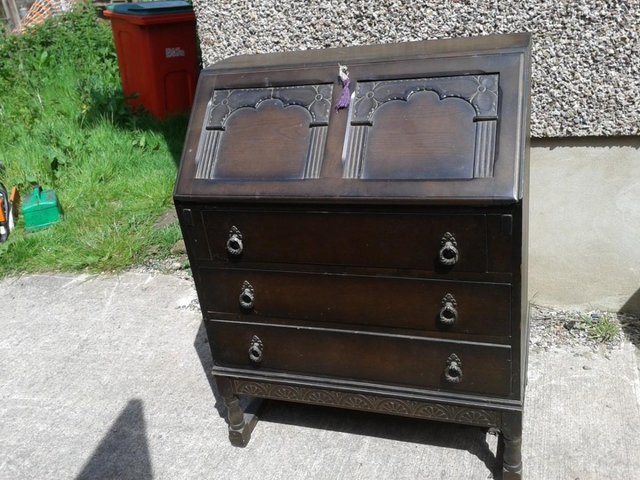 Preview of the first image of Vintage dark wood bureau with lock and key.