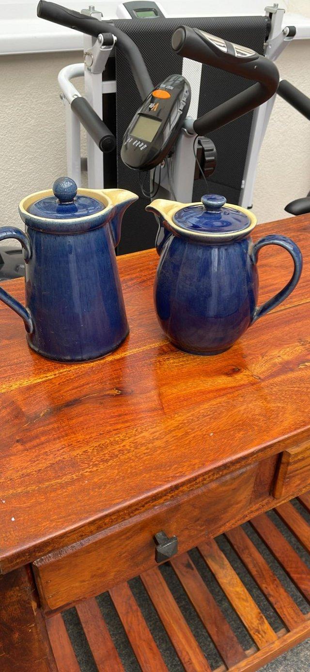 Preview of the first image of Two Denby Water Jugs Blue and Yellow.