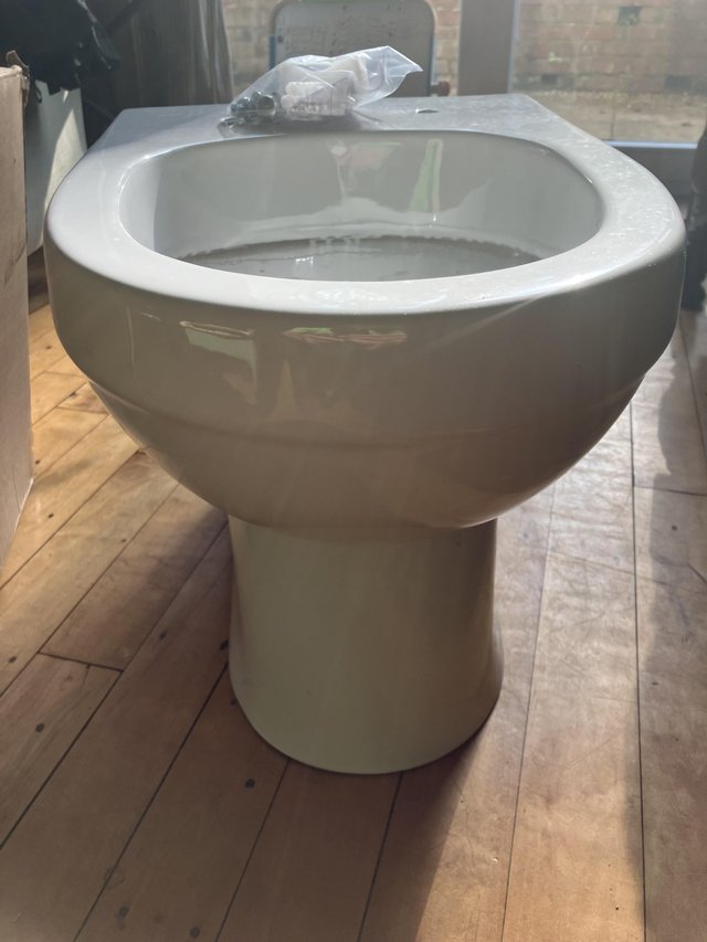 Preview of the first image of Toilet bowl, cistern and seat; Victoria Plum.