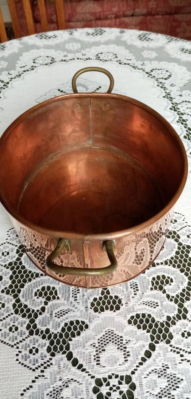 Preview of the first image of Antique copper planter with brass handles.