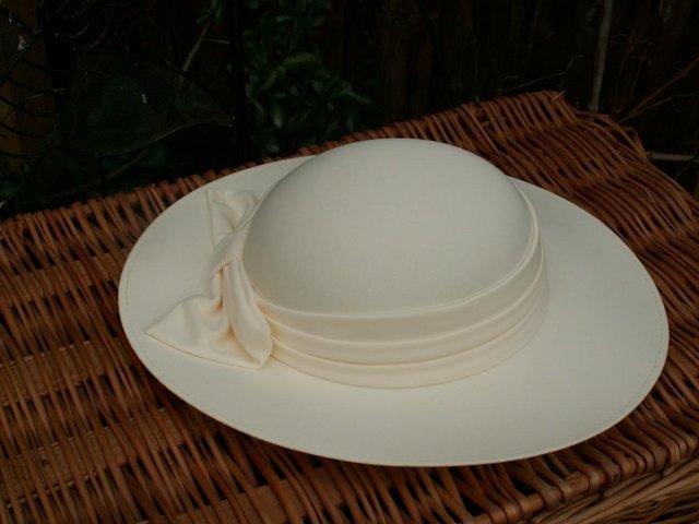 Preview of the first image of Hat for a special occasion. Cream..