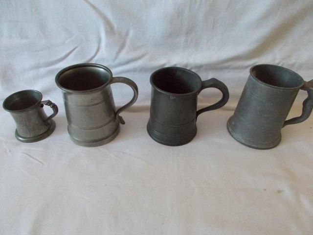 Preview of the first image of 4 English Pewter Tankards, inc Victorian & Art Deco.