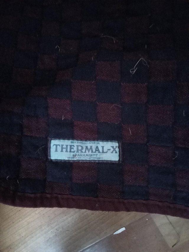 Preview of the first image of Thermalux 5.9" rug, good used condition..