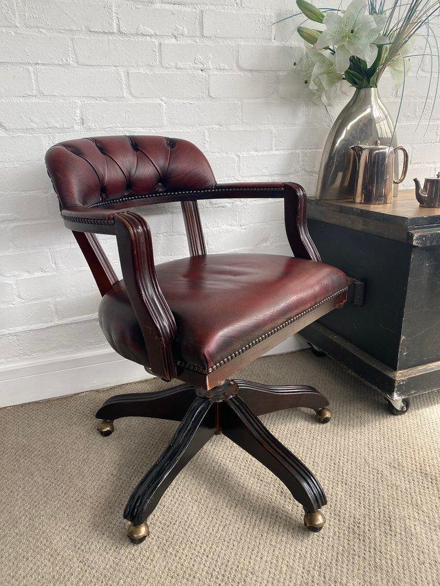 Preview of the first image of Oxblood Chesterfield office swivel desk chair. Can deliver..
