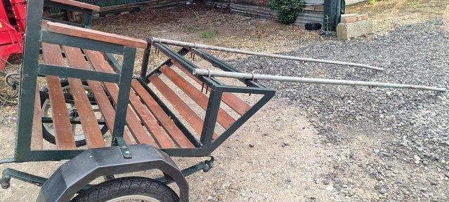 Preview of the first image of 2 wheeled exercise cart been barn stored.