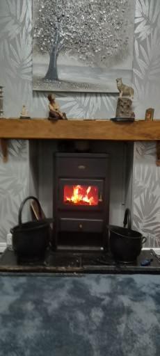 Preview of the first image of 9.5 kw multi fuel stove with all fittings.