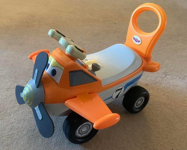 Preview of the first image of Disney Planes “Dusty” Ride on Activity Toy with lights and s.