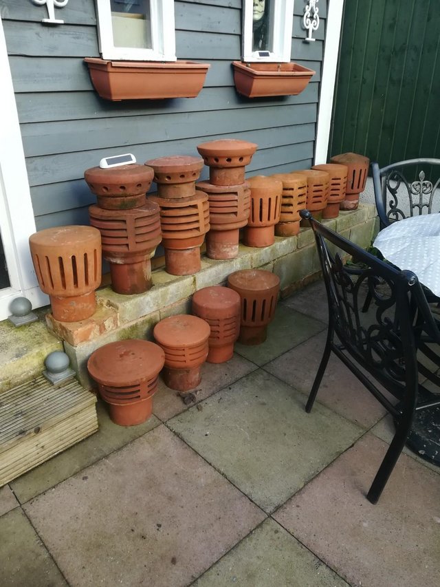 Preview of the first image of Assortment of chimney pots, cows etc poss del/fit?..
