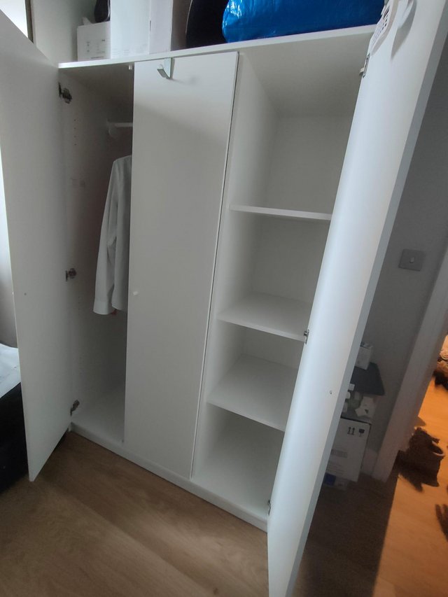 Preview of the first image of Wardrobe white, hanging and shelving.
