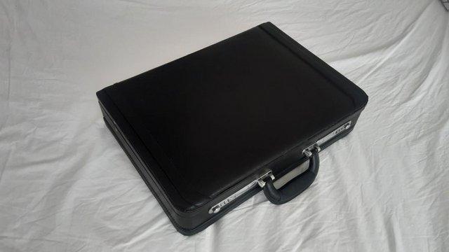 Preview of the first image of Bonded leather briefcase - black.