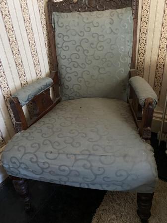 Image 1 of Old chair with some carved features. Valued at £100.