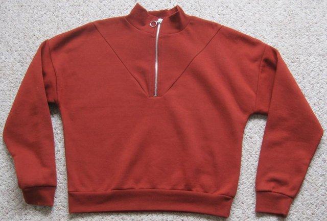 Image 1 of Rust coloured Sweatshirt, size XS