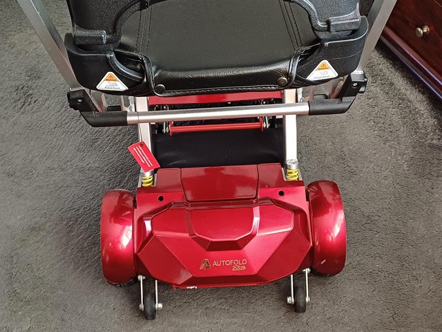 Preview of the first image of Auto fold mobility scooter. AS NEW!.
