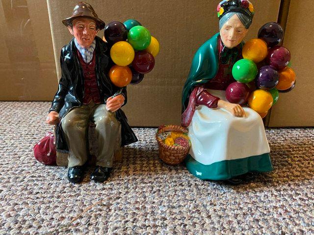 Preview of the first image of Royal Doulton Old Balloon Seller pair - Man and woman.