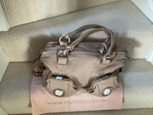 Preview of the first image of Leather mink coloured Mimco handbag perfect condition.