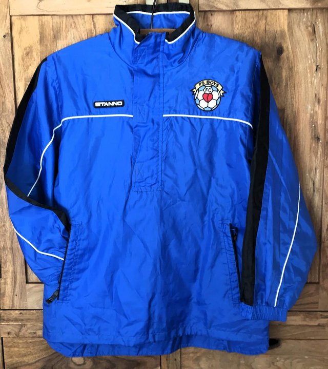 Preview of the first image of Unused Stanno blue hooded jacket. PS Boys FC. Can post..