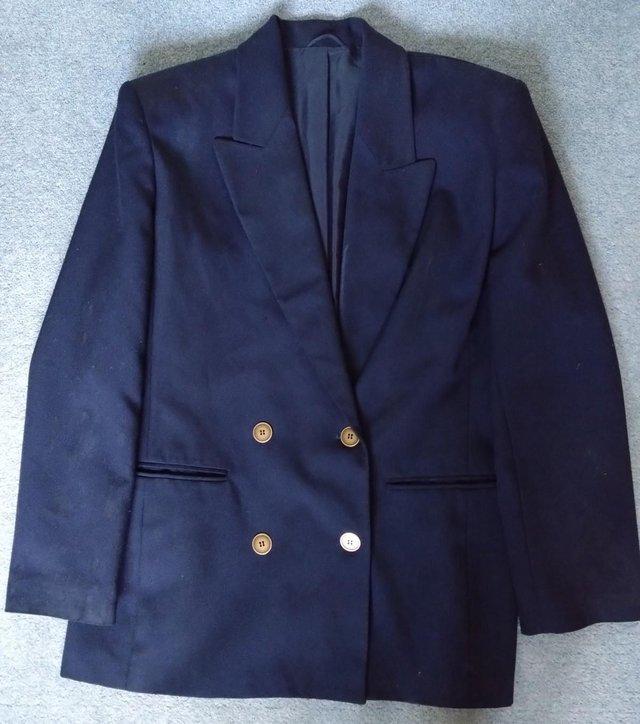 Preview of the first image of St Michael black women’s double-breasted suit jacket-size 14.