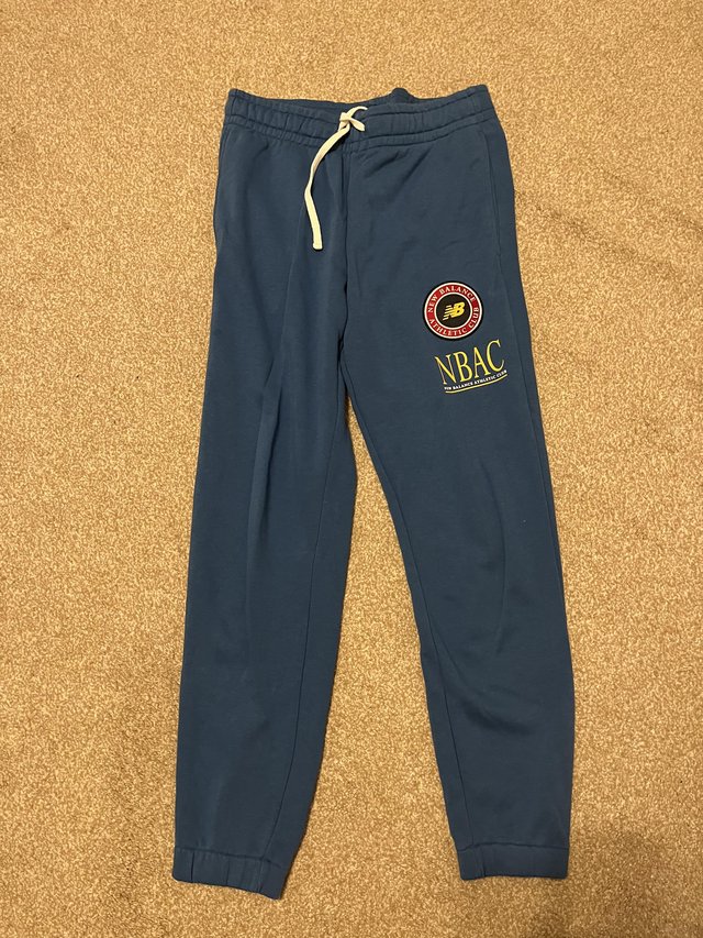 Preview of the first image of New Balance Track Pants- size M.