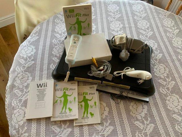 Preview of the first image of Nintendo Wii Fit Plus system with balance board.