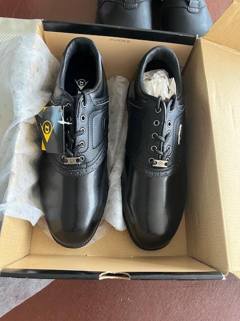 Preview of the first image of Dunlop Mens Black All Weather Performance Spiked Golf Shoes.