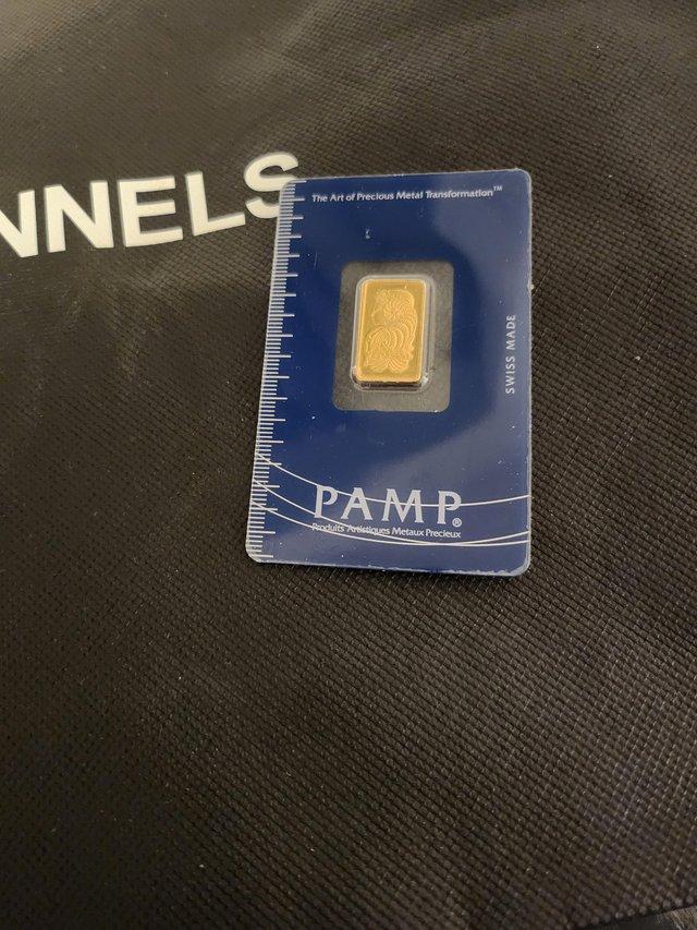 Preview of the first image of 24k soild pamp bar sealed in pack.