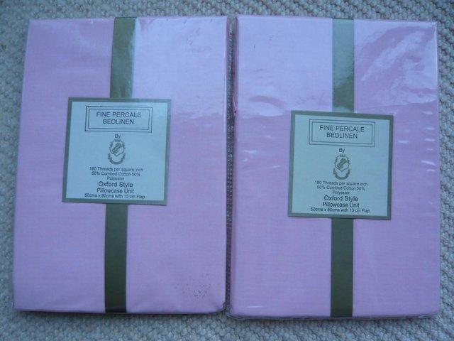Preview of the first image of Pillowcases - pair, pink, brand new.
