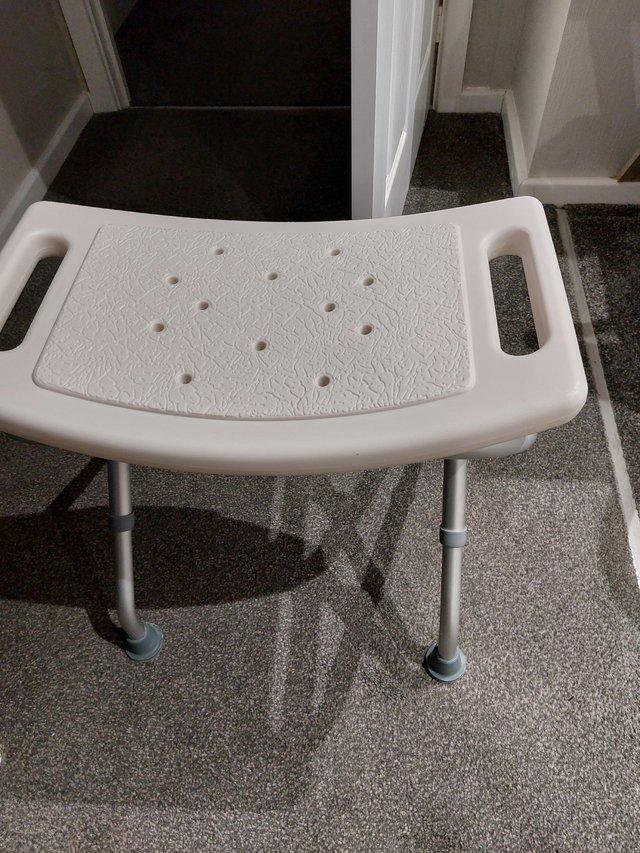 Preview of the first image of Folding shower seat,  could be used in the bath as well.