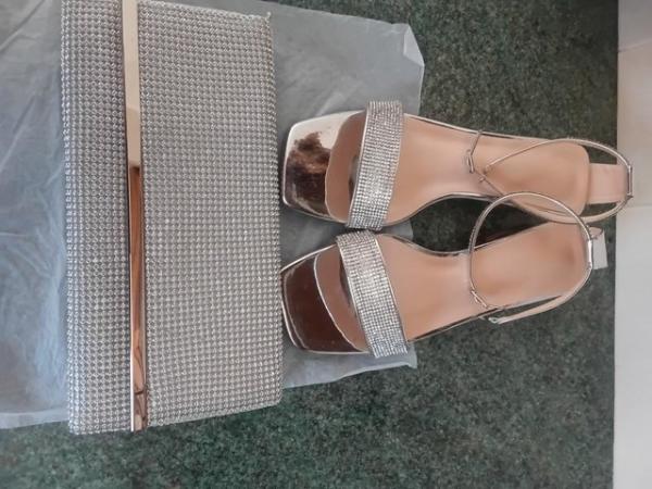 Image 1 of Sparkly silver sandals and cluch bag.